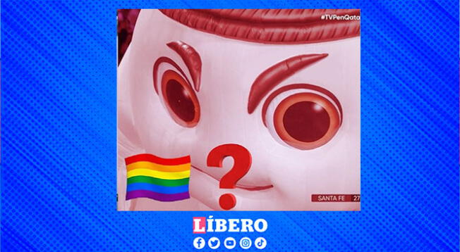 Las mascota del mundial contra el hincha con la bandera LGTBI+