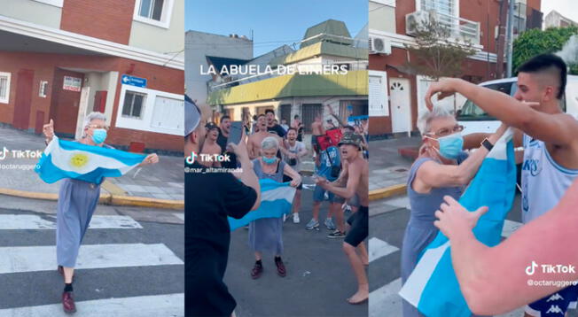 Adulta mayor celebra en la calle junto a la hinchada de Argentina.